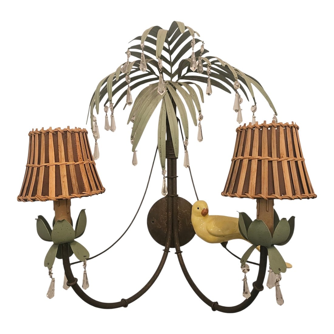 Vintage Hollywood Regency Tole Metal Palm Tree Sconce: Vintage painted metal palm tree wall light is in Hollywood Regency style, futures charming yellow ceramic bird perched on the branch and split bamboo lamp shades with added crystal drops. Condition: