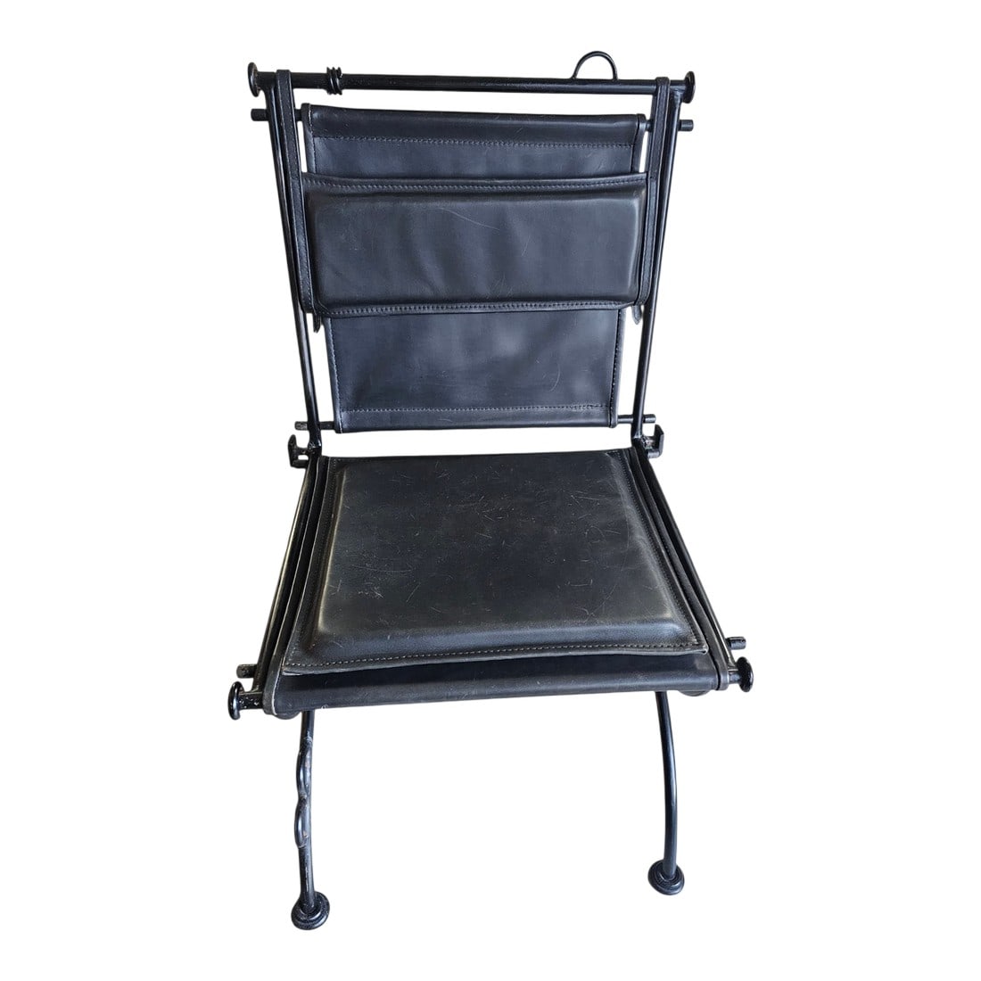 1960s Brutalist Style Sling Chair by Ilana Goor: Ilana Goor is known for brutalist style wrought iron and leather sling chairs with industrial aesthetics. Condition: Alterations: Original Condition Unaltered Imperfections: Some Imperfections