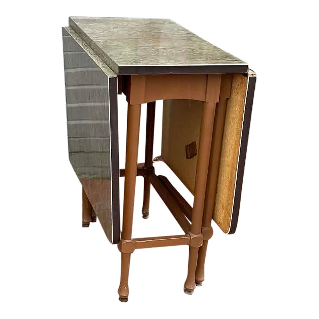 Vintage Retro Formica Folding Drop Leaf Dining Table: This is a vintage mid-century drop-leaf table, commonly used in kitchens or small dining areas for its space-saving design. It features a decorative Formica laminate top with a wood-grain pattern and