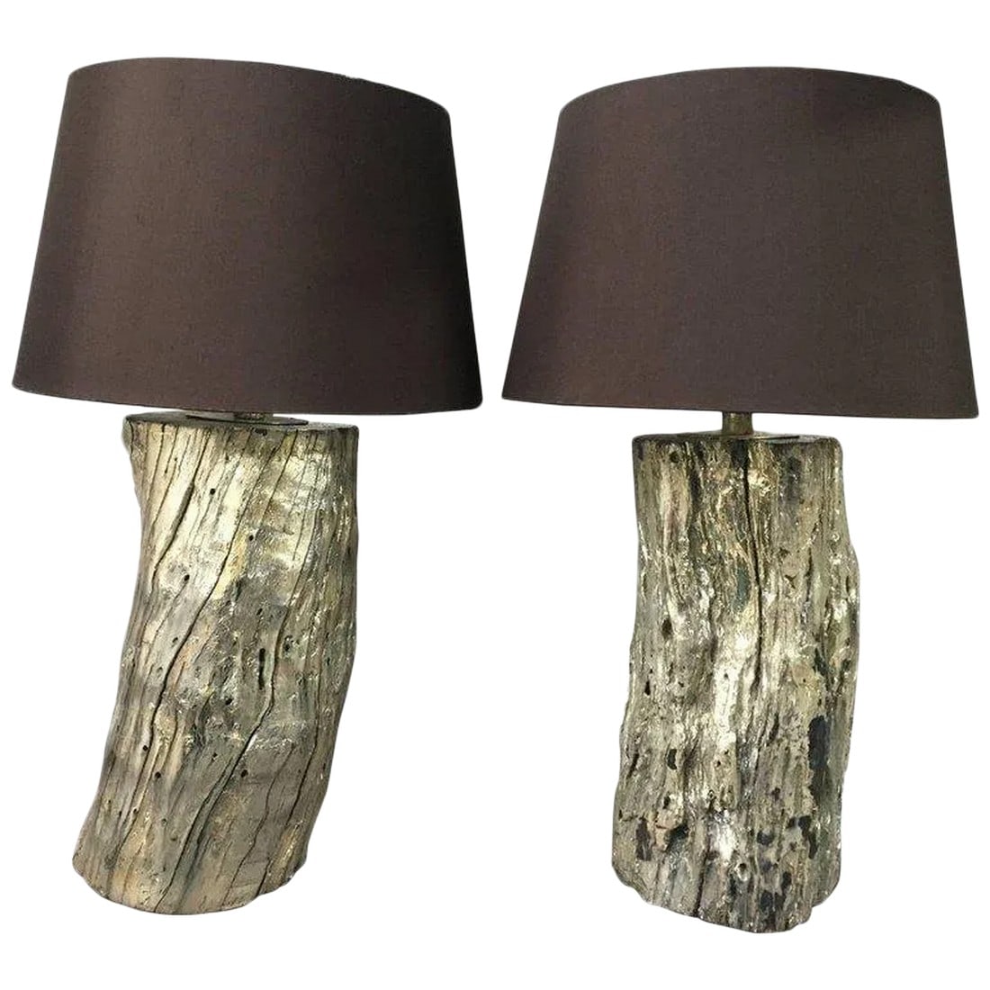 Silvered Giltmetal on Wood Table Lamps - a Pair: Two eye-catching table lamps having chunky organic log wood bases glamorized with silvered giltmetal and custom brown silk shades. By Tanner Kenzie. Condition: Alterations: Original Condition Unaltere