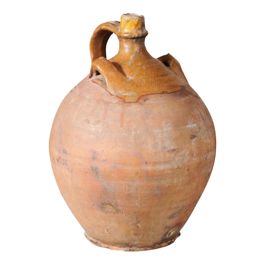 Rustic French 19th Century Pottery Jug with Yellow Glaze and Three Handles: A French pottery water jug from the 19th century with yellow glaze and three handles. Enhance your collection of French pottery with this charming 19th-century water jug. Hand crafted, this piece