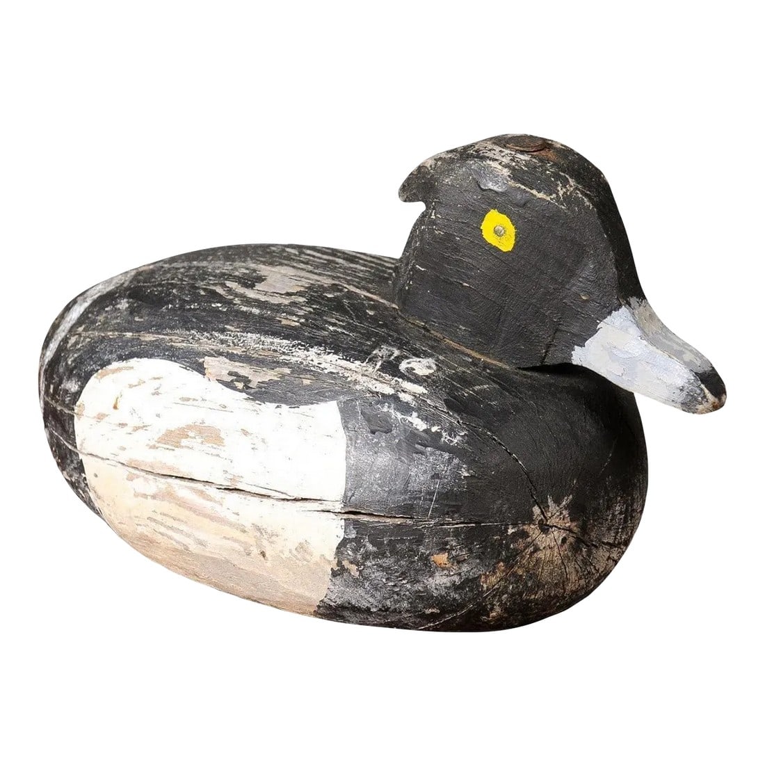 Rustic French 20th Century Carved Wooden Duck with Black, White and Yellow Paint: A French carved wooden duck from the 20th century with rustic appearance, white, black and yellow paint. Envelop your space with an air of tranquility and pastoral bliss with this delightful French