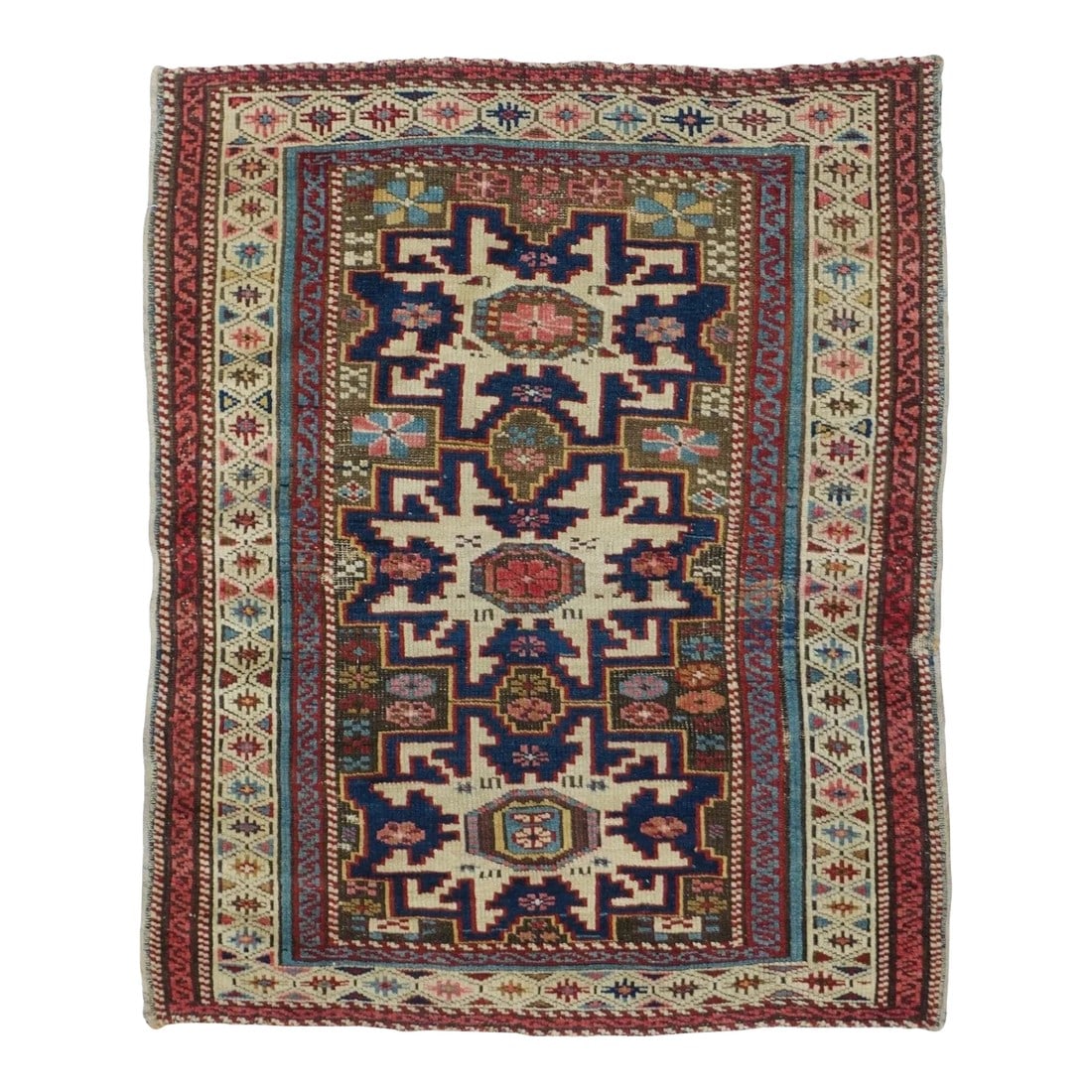 Antique Shirvan Rug 2'7'' x 3'2'': The abrashed red field of this small east Caucasian scatter shows well-covered by three conjoint cream and dark blue 12 point "Lesghi stars" with flattened rosettes of various sizes, all within a