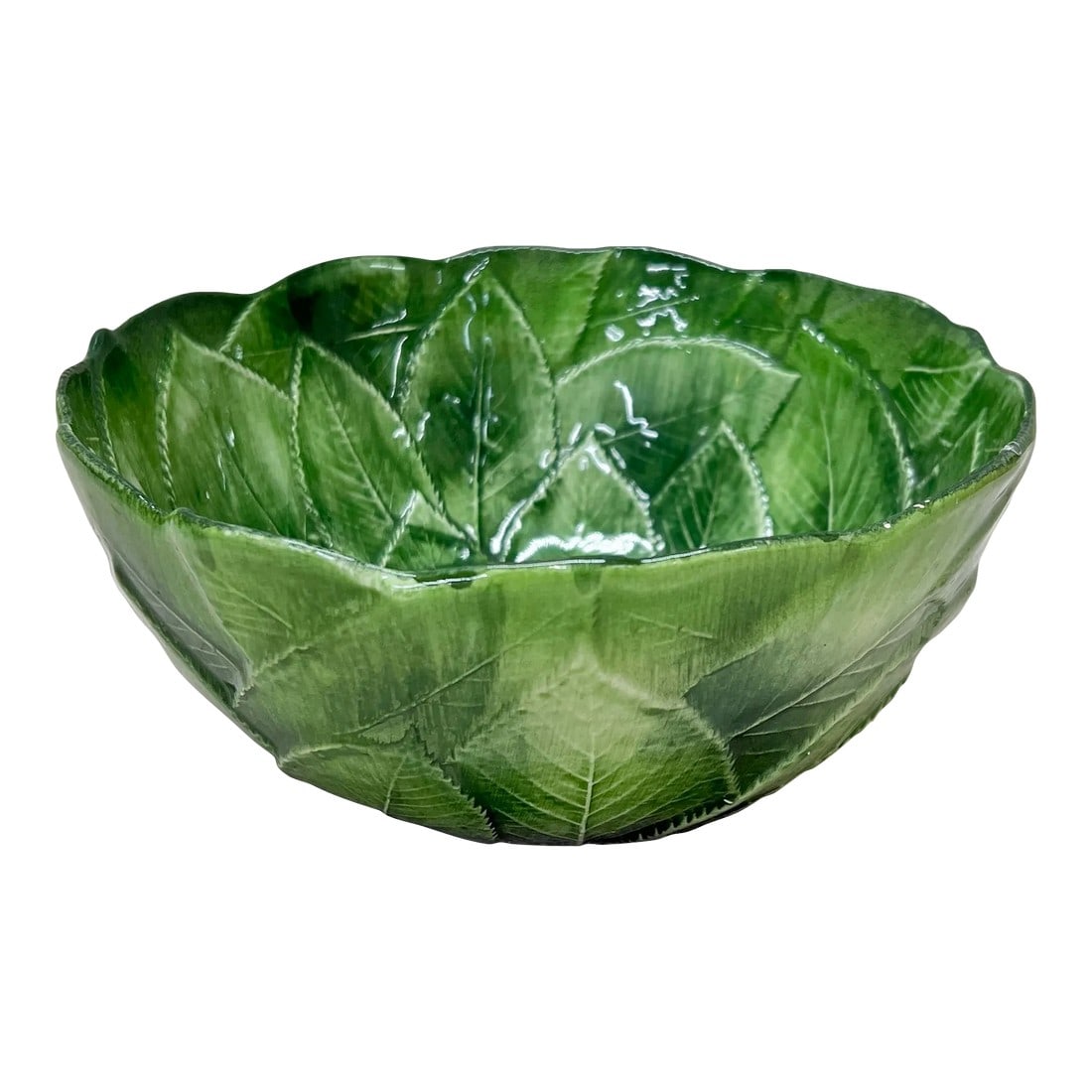 Italian Green Leaf Pattern Bowl: Italian green majolica bowl with leaf pattern. Measures 7.5" diameter x 3.25 " h. Marked made in Italy. Condition: Alterations: Original Condition Unaltered Imperfections: Some Imperfections
