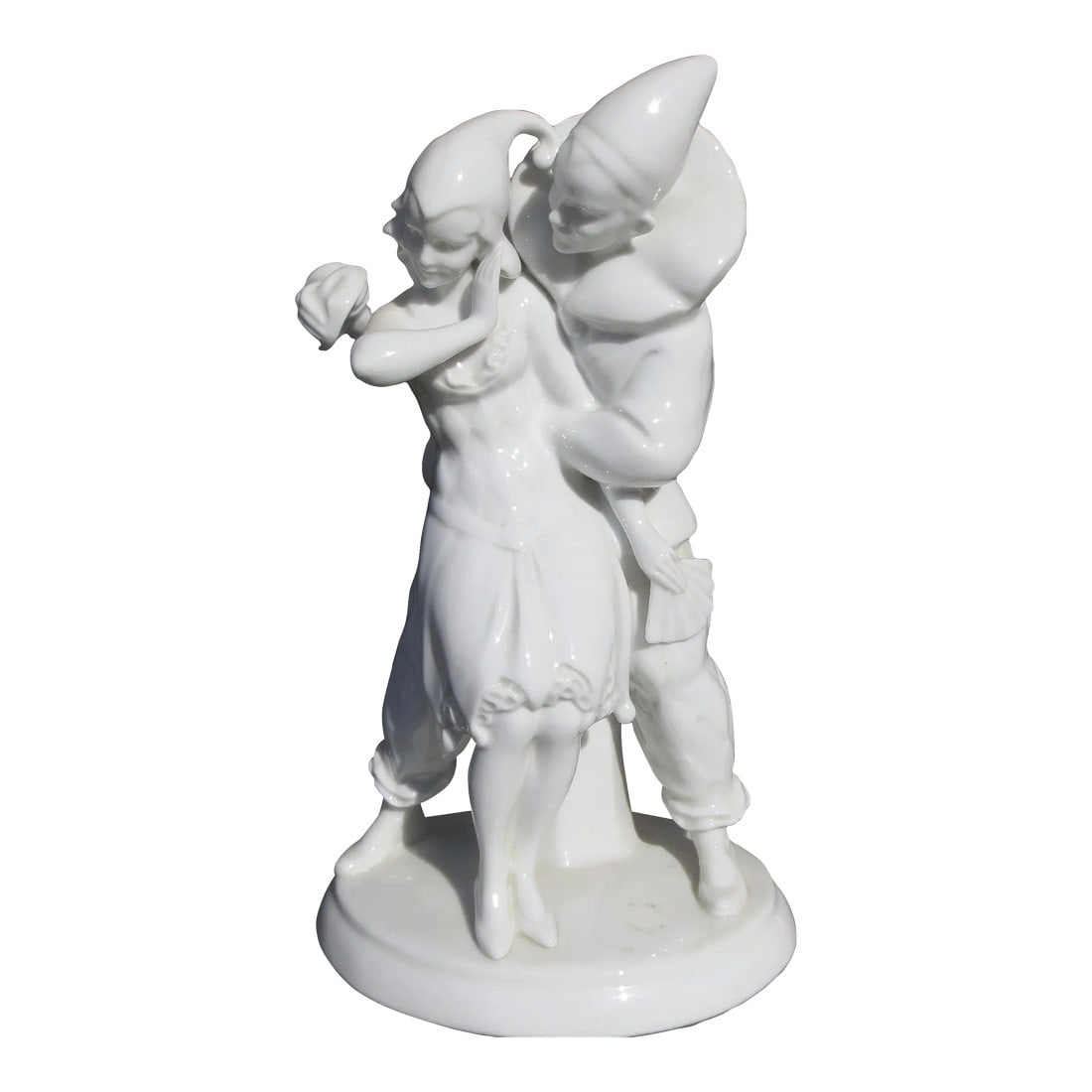 Pierrot and Pierrette Blanc De Chine Porcelain Figures Circa 1920's: Pierrot And Pierrette playing a courtship at the masquerade. Beautifully designed couple in a moment of fun , the unmasking. Beautifully modeled and moving in a lively and fun moment. The figure is
