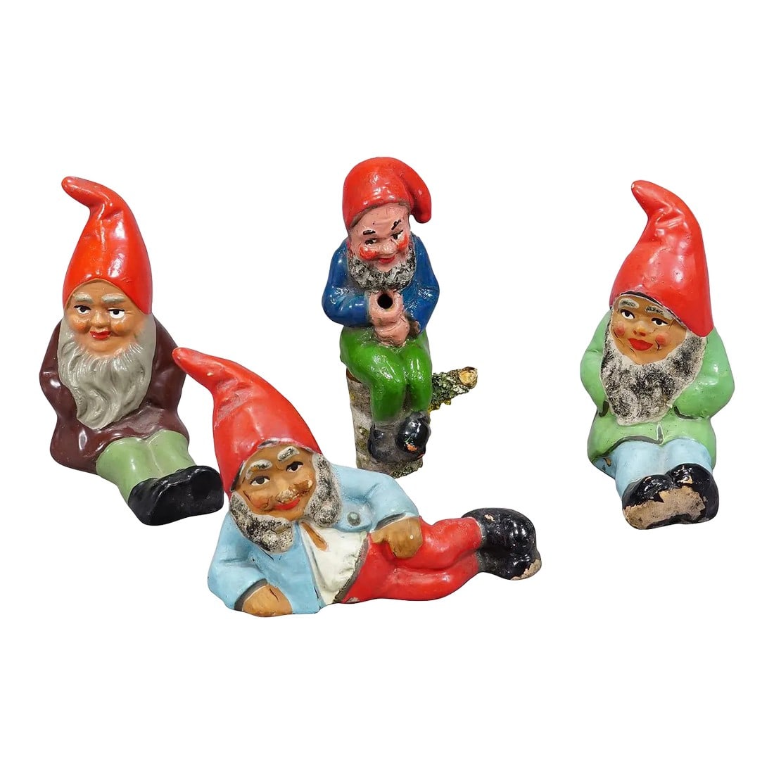 Lot of Four Tiny Terracotta Garden Gnomes, Germany Ca. 1950s: Lot of Four Tiny Terracotta Garden Gnomes, Germany ca. 1950s A whimsy set of four tiny garden gnomes made in Germany ca. 1950s probably by Heissner. They are made of terracotta and hand-painted with b