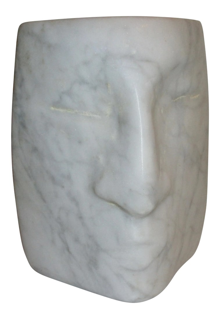 1960s Vintage Jacob Sandler Marble Head Sculpture: Smooth block of what Carrera Marble with fine grey veins throughout. Face seem as almost emerging from a triangular corner of marble. Nose , mouth and eyes are seen as slight projections from