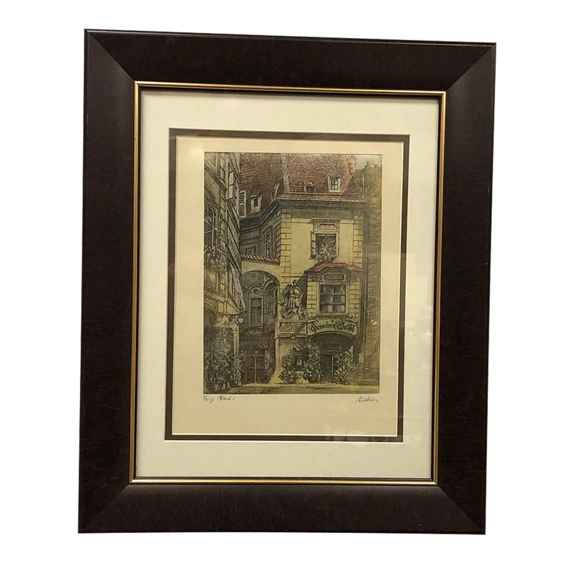 Mid 20th Century Print Signed on the Bottom, Framed: Print, Signed on the Bottom - 14" x 17" This signed print captures an intricate and detailed depiction of a charming architectural scene, measuring 14 inches wide and 17 inches tall. The artwork
