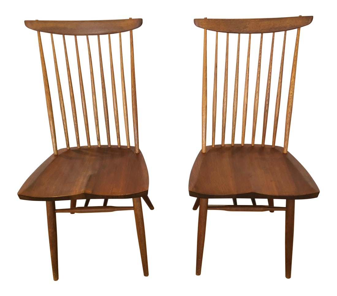 1950s Vintage George Nakashima "New Chairs"- A Pair: An iconic pair of early circa 1952 George Nakashima "New Chairs" masterfully constructed out of walnut. Letter of authenticity included. Condition: Alterations: Original Condition Unaltered