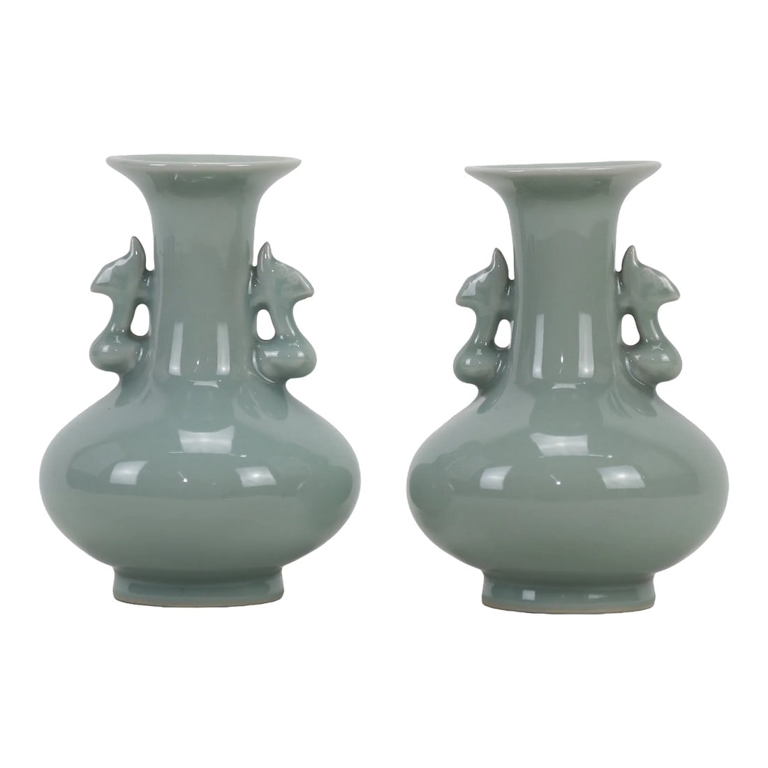 Pair of Chinese Longquan Kiln Powder Green Glaze Amphorae: Chinese Longquan Kiln Powder Green Glaze Amphorae Condition: Alterations: Original Condition Unaltered Imperfections: Some Imperfections Condition Notes: It is in very good condition, but has some