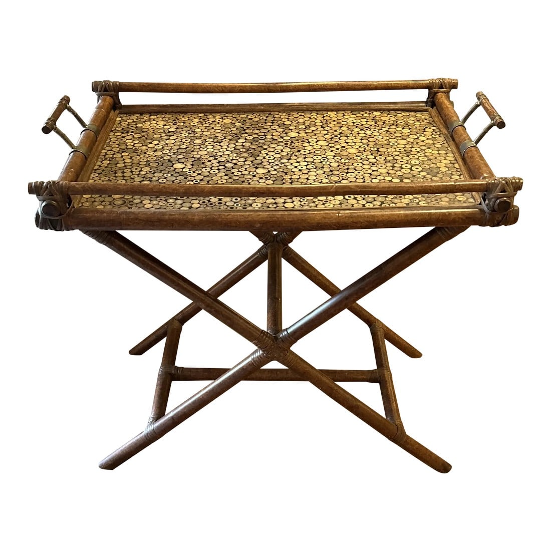Maitland Smith Campaign Style Tray Table Bar: Handsome tray table bar having re-moveable tray from stand; campaign style with beautiful warm brown finish and leather wrapped joints. The tray has a fascinating surface with cheerio shaped inlaid