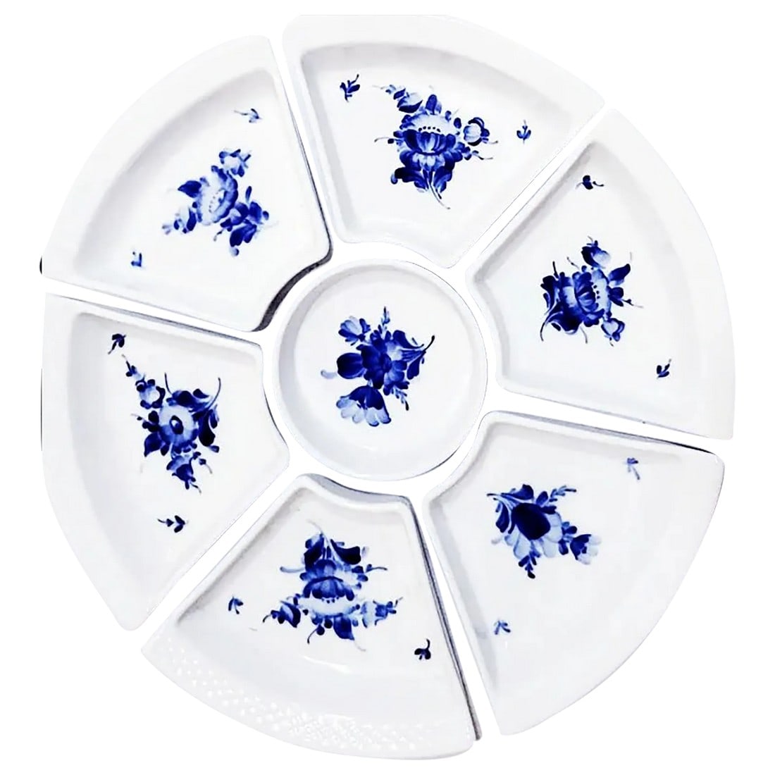 Royal Copenhagen Blue Flowers Curved Lazy Susan - 7 Pcs: Royal Copenhagen lazy susan. The pattern is "Blue Flowers Curved" and consists of 6 triangular pieces and 1 round middle piece.. Note: This does not come with a platform since Royal Copenhagen only