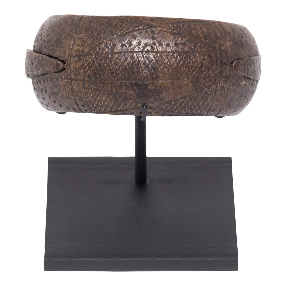 Antique Incised Copper Currency Anklet: Time honored texture and form define this Nigerian copper sculptural object. The intricate geometry was achieved through a process known as scarification. The artisan would meticulously trace and