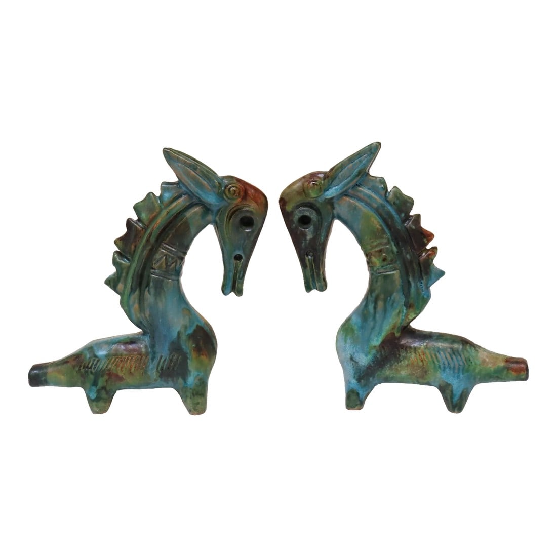 Pair of Italian Modernist Sea Garden Ceramic Horses by Alvino Bagni for Raymor: Scarcely seen ceramic horses from the "Sea Garden" line designed by Alvino Bagni for Raymor (ca. 1960, Italy). Attractive oceanic color combinations with incised geometric shapes and facial details.
