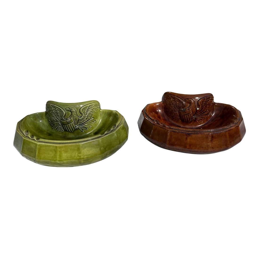 Pair of 1970s Ceramic Green and Brown Catchalls With Eagle Accents: Up for consideration is a beautiful pair of ceramic green and brown catchalls with eagle accents. These would look lovely in your home and they are a great find for the interior design enthusiast.