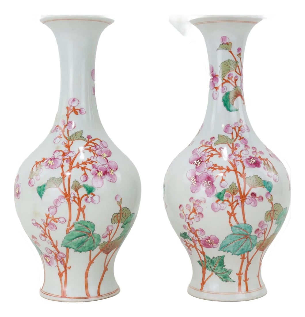 Pair of Chinese Famille Rose Porcelain Vases With Plum Blossom Design: A stunning pair of Chinese Famille Rose porcelain vases, elegantly hand-painted with delicate pink plum blossoms on twisting branches. The intricate floral pattern, set against a smooth white glaze,