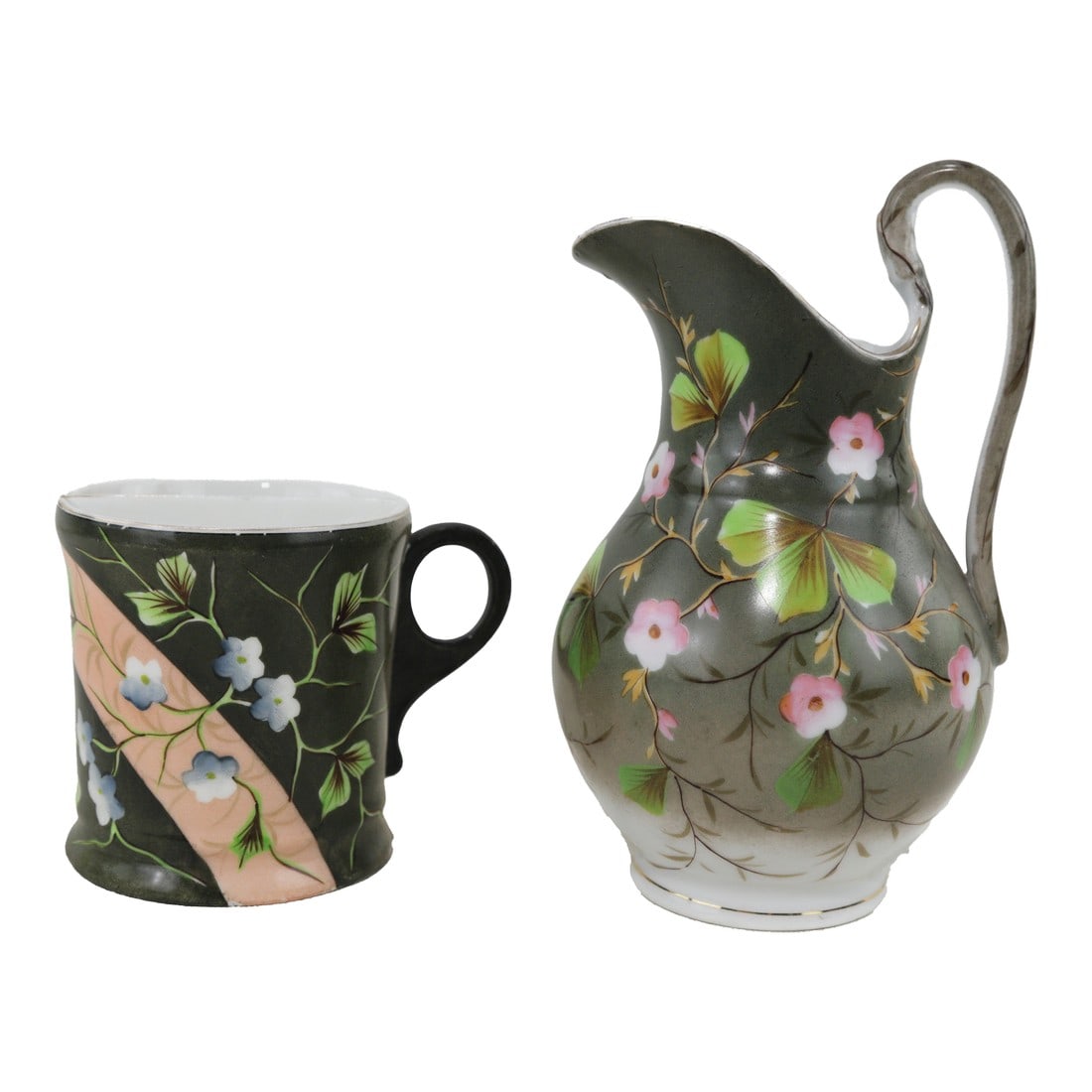 Victorian Vintage Hand-Painted Porcelain Pitcher & Cup Set – Floral Art Nouveau Design: This elegant vintage porcelain pitcher and cup set showcases a stunning hand-painted floral motif in soft pastel hues against a rich dark green background, exuding timeless Art Nouveau charm. The