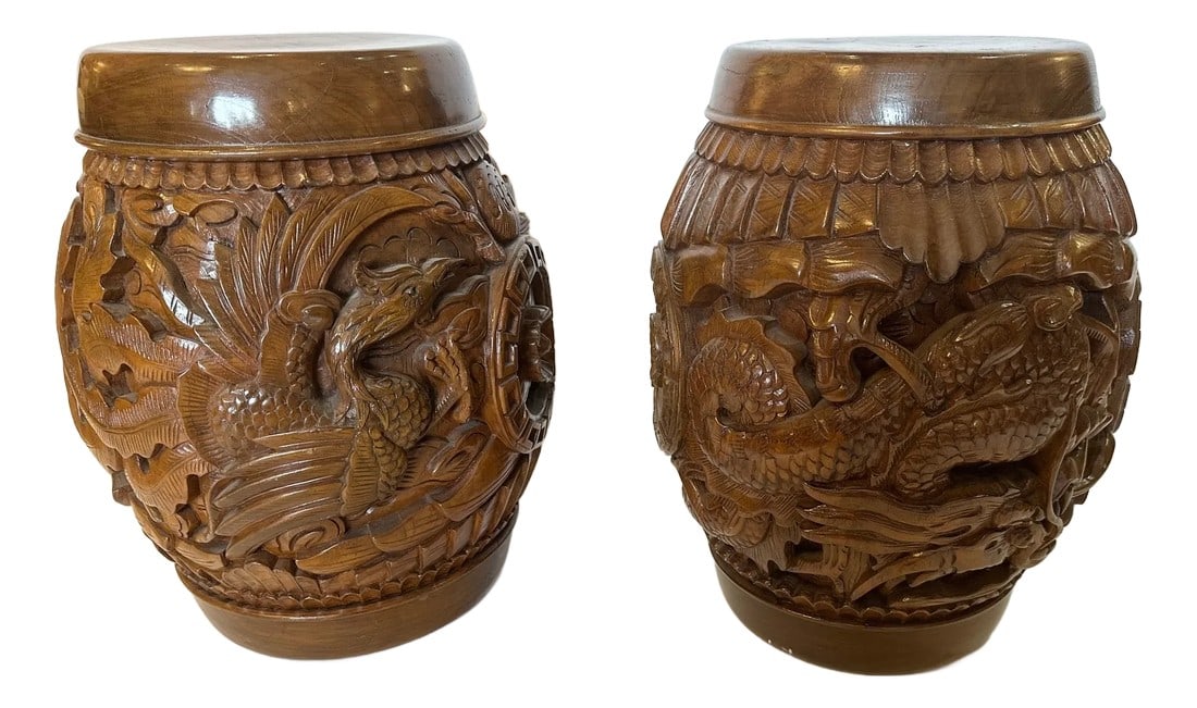 Carved Wooden End Tables -a Pair: Pair of impressively carved solid wood end tables having the shape of garden stools, with dolphins, birds, flora and fauna. Beautiful grain on top which is 9" diameter Condition: Alterations: