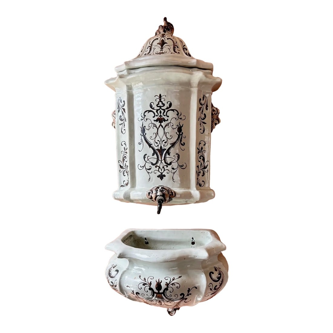 Italian Ceramic Lavabo: Italian Ceramic Handpainted Lavabo. There are three separate pieces. Figures on each side and the fun spout! Signed Italy on the back. Top including the lid measures: 24" H x 14" W x 8" D Bottom