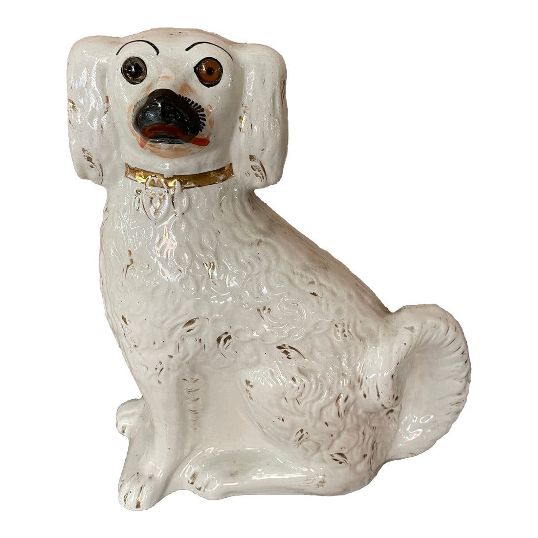 Stafforshire Dog Late 19th C.: Who could possibly resist the eyes of this Staffordshire dog? Certainly not me! He's begging for a good home and doesn't eat much. Condition: Alterations: Original Condition Unaltered Imperfections: