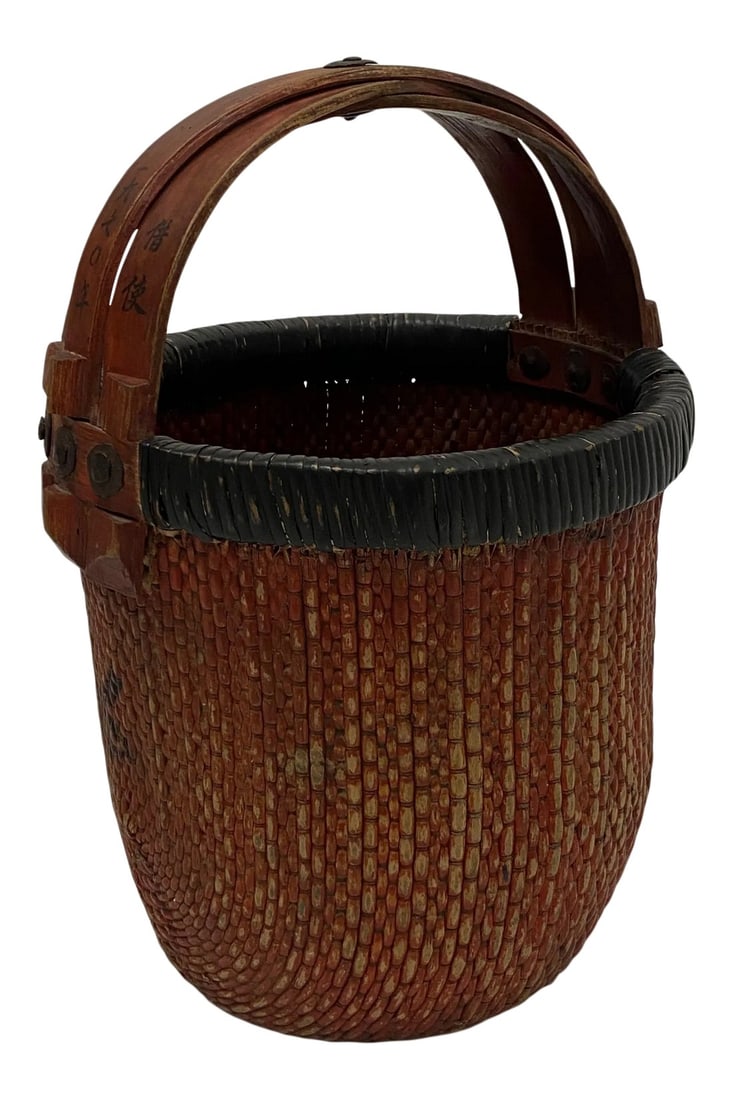 Chinese Woven Rattan Market Basket: A wonderful Chinese woven rattan market basket having decorative writing on the wooden handle and a great reddish patina. Condition: Alterations: Original Condition Unaltered Imperfections: Some Imper
