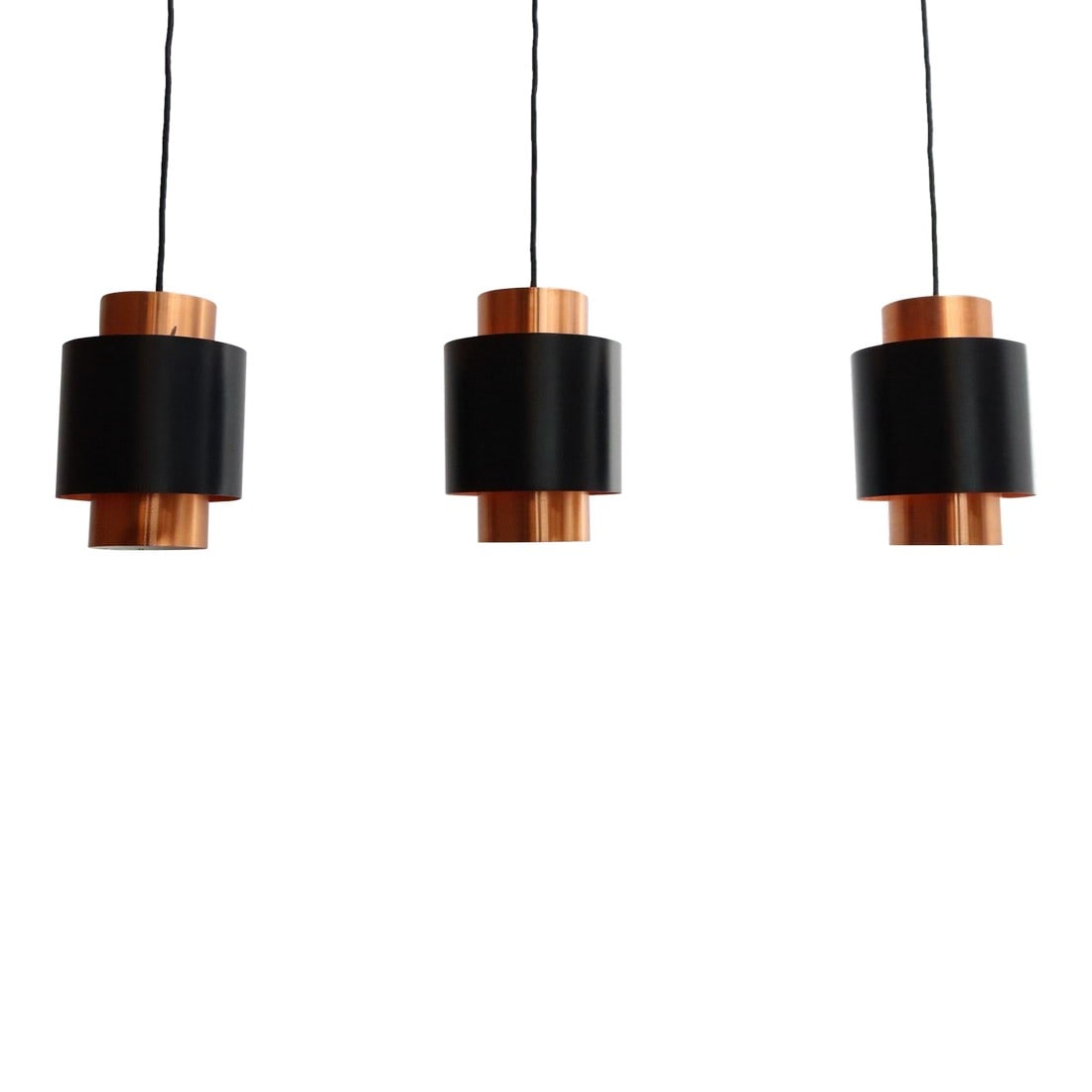 Set of Three Danish Tunika Copper Pendant Lamps by Jo Hammerborg for Fog & MÃ¸rup: Set of three 'Tunika' hanging pendant lamps from the "Saturn Series" designed by Jo Hammerborg for Fog & MÃ¸rup (ca. early 1960s, Denmark). As the name suggests, the concept of the design