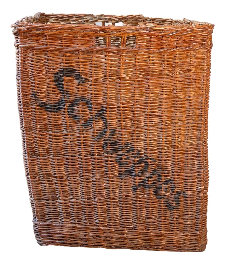 Early 20th Century English Wicker Advertising Basket – Schweppes: A rare and sculptural early 20th-century English wicker advertising basket, originally used for transporting or displaying goods from the iconic beverage company Schweppes. Crafted from handwoven