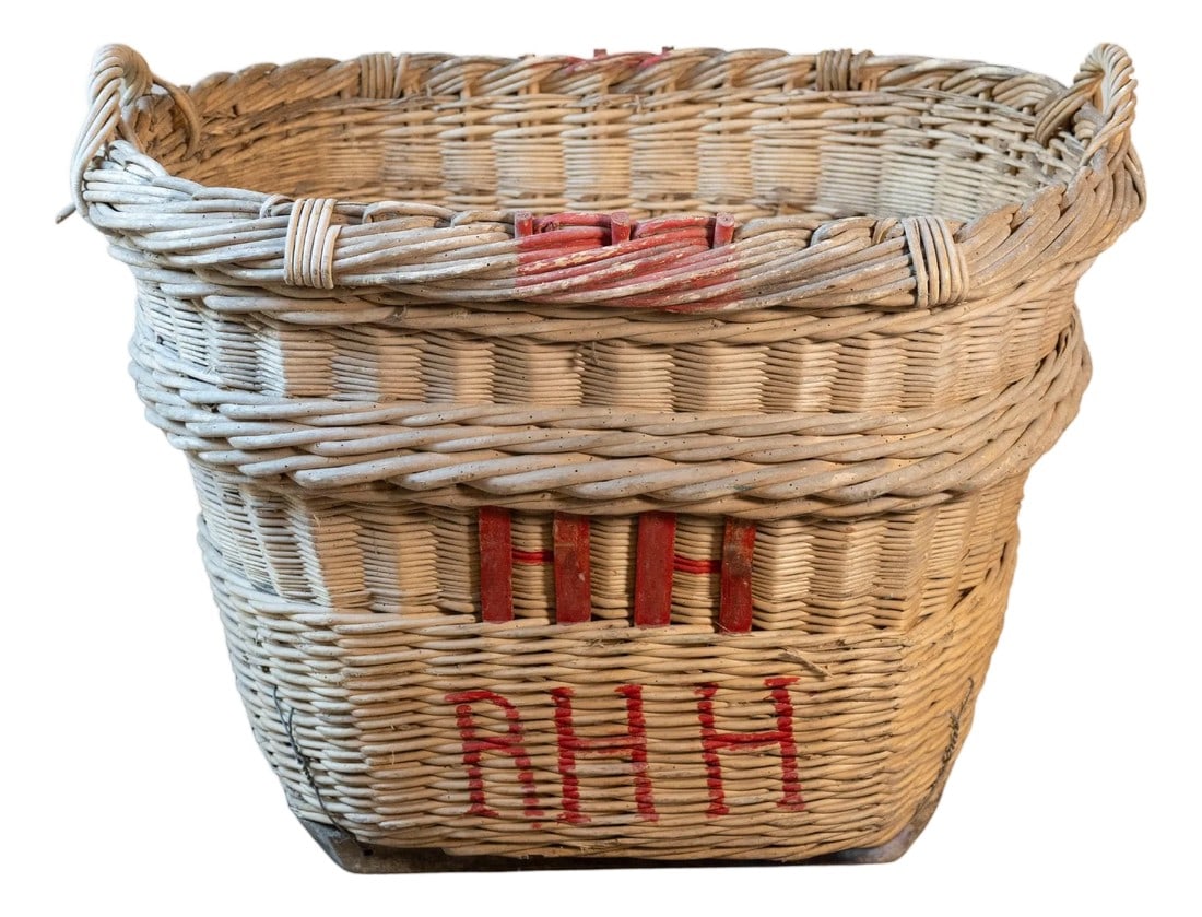 French Champagne Harvesting Basket: A rare and beautifully preserved French Champagne harvesting basket dating to the 1940s, hailing from the legendary vineyards of the Champagne region. This hand-woven willow basket was once a vital to