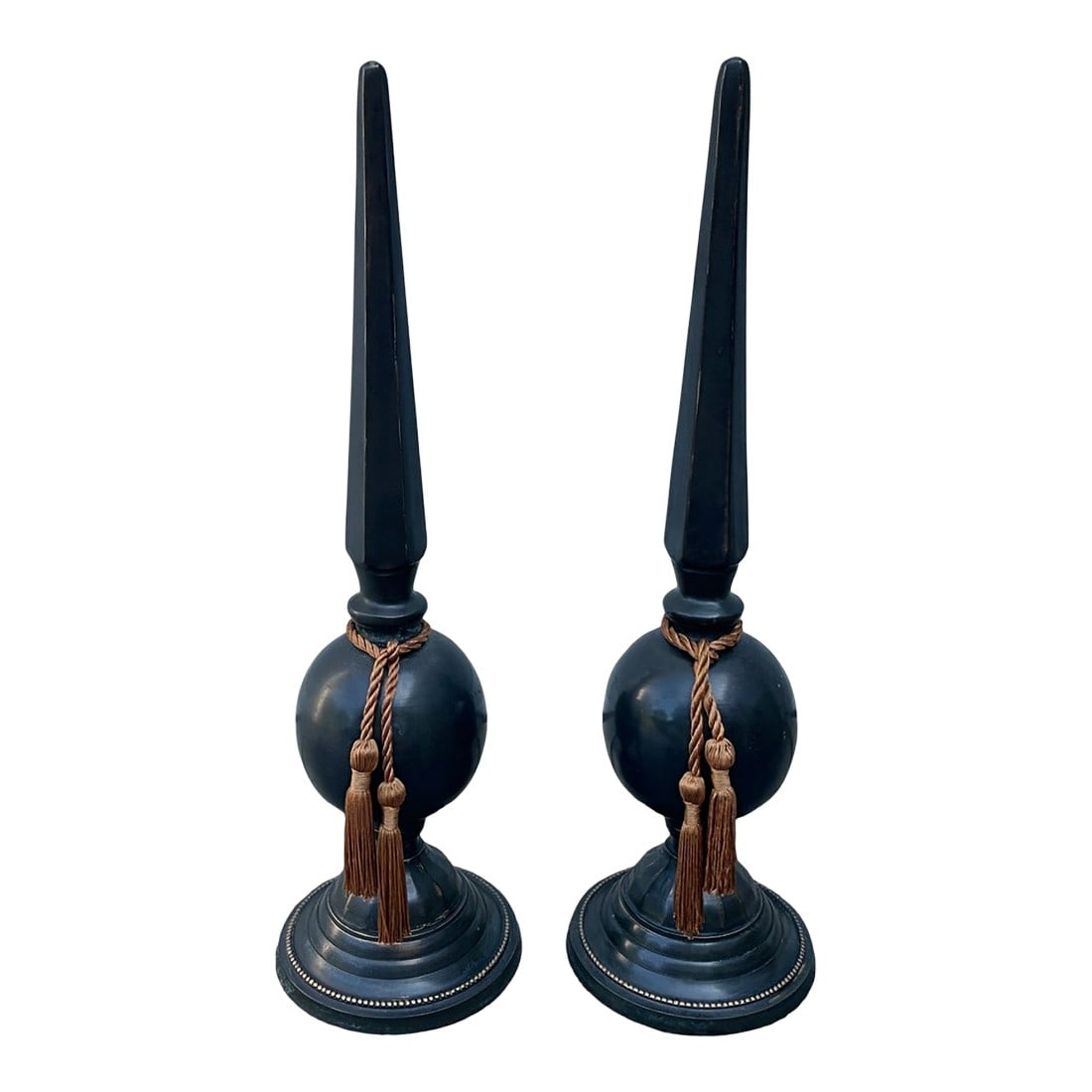 Pair of Tall Antique Neoclassical Patinated Bronze Obelisks: Pair of Tall Antique Neoclassical Patinated Bronze Obelisks Beautiful pair of old spire shaped bronze obelisks with silk tassels. Perfect for a fireplace mantle to add a touch of class and old world