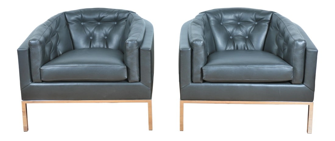 Mid Century Pair of Leather and Steel Lounge Chairs: Gorgeous pair of leather tufted reupholstered lounge chairs with steel bases.. Excellent comfortable condition.. Both are strong and sturdy.. Great for any Mid century home. --------------------------