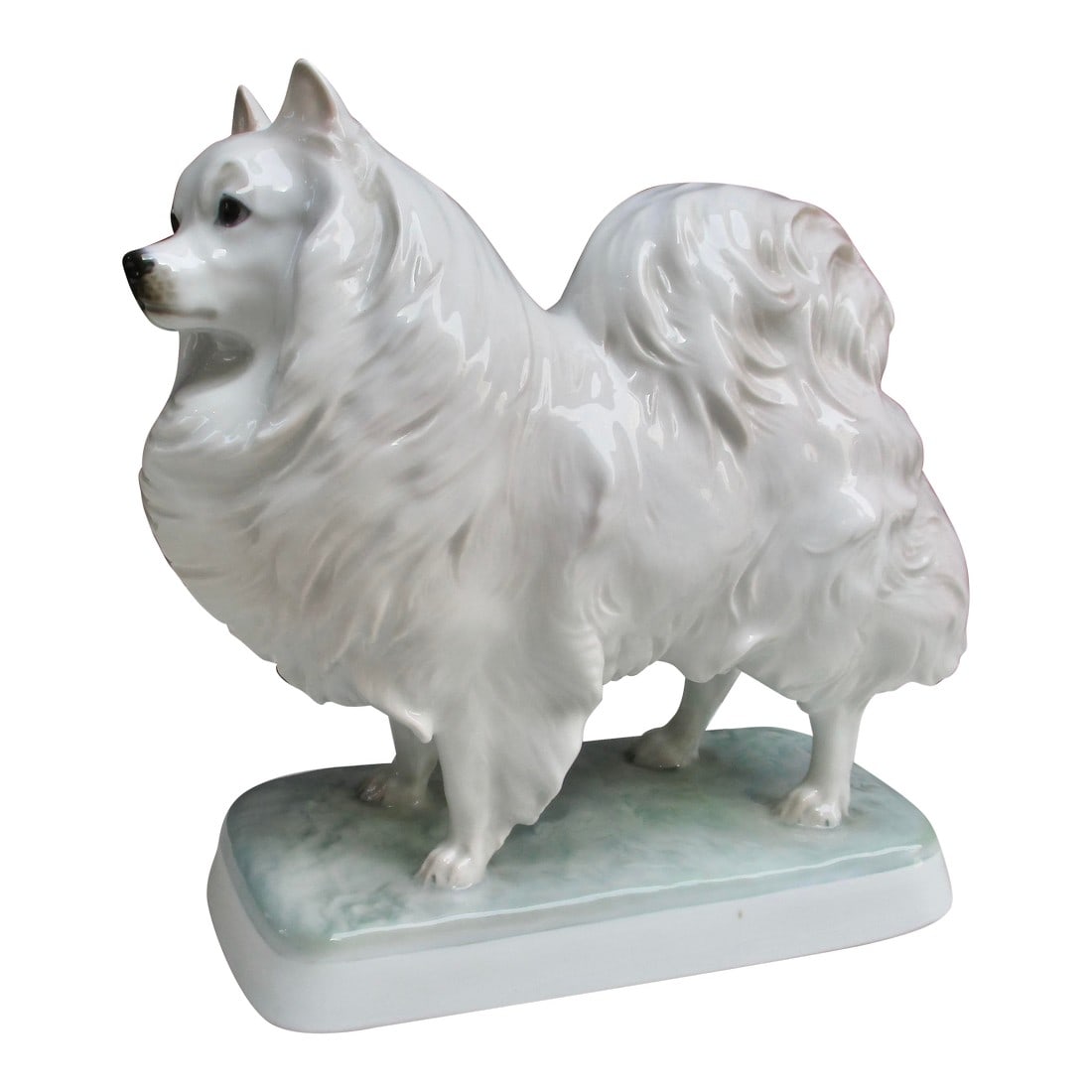 Rosenthal Porcelain Dog Spitz Circa 1925- 1935: Excellent early porcelain figure of a spitz. Rosenthal Porcelain dog measuring 7" tall and 7" by 3" deep. Excellent condition. Condition: Alterations: Original Condition Unaltered Imperfections: Some
