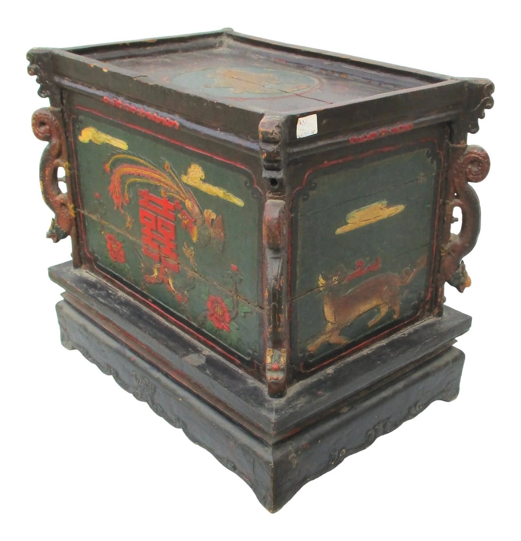 Chinese Provincial Lidded Trunk Hand Made Antique: Provincial wooden trunk with serving tray. The edges are carved with dragons, each side is a carved cartouche featuring mythic animals. The top is a carp, the front and back the Phoenix bird, the ends