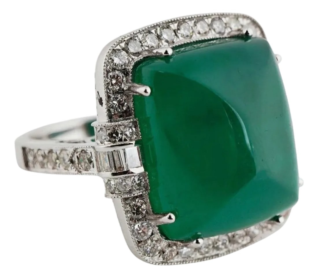 Natural Zambian caboshan Emerald diamond ring in 18k gold: GW=10.500gm NW=6.618gm diamond baguette=0.16cts emerald cab=18.33cts These all are brand new pieces . Condition: Imperfections: No Imperfections Condition Notes: New Category: Cocktail Rings Origin:
