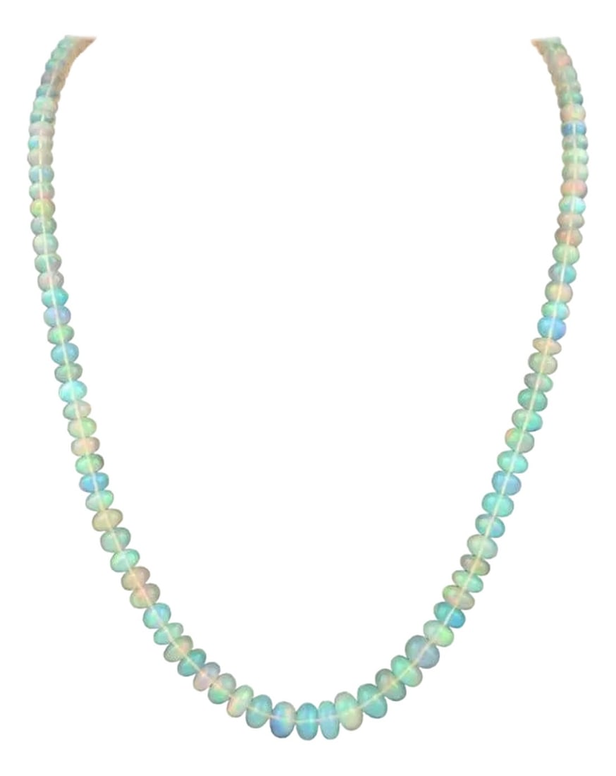 Natural Opal Faceted Bead Single Strand Necklace on Sale 14 K Gold Lobster Clasp: Natural Opal single strand Bead Necklace with heavy 14 Karat yellow gold clasp 17" long 1 layers of Natural opal Beads approximately 70 ct opal These are faceted beads so has lots of shine and glare B