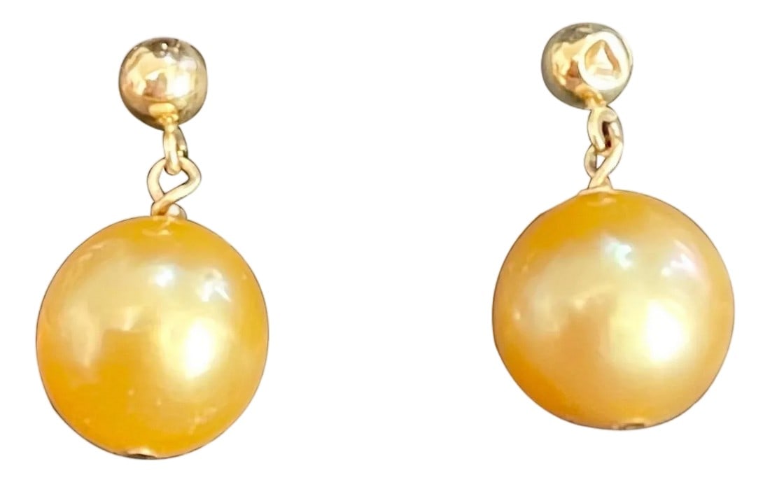 Golden South Sea Pearl Dangling Earrings 14 Karat Yellow Gold: 10 MM Golden South Sea Pearl Dangling Earrings 14 Karat Yellow Gold All pearls are absolutely clean with no blemishes .Approximately 10 mm small gold stud at the top of the earring which sits on ear