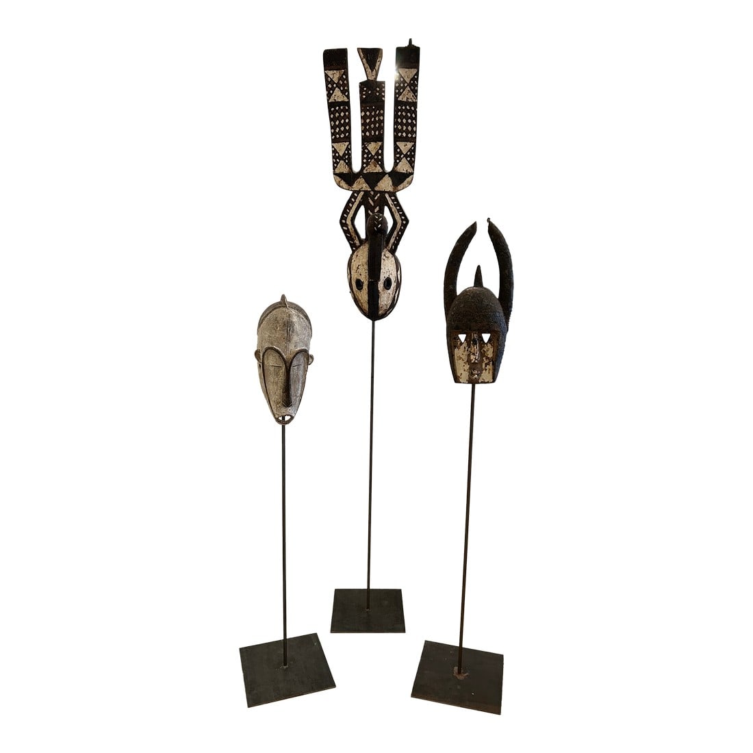 Collection of African Carved Wood Masks on Tall Custom Iron Stands (1 of 16)