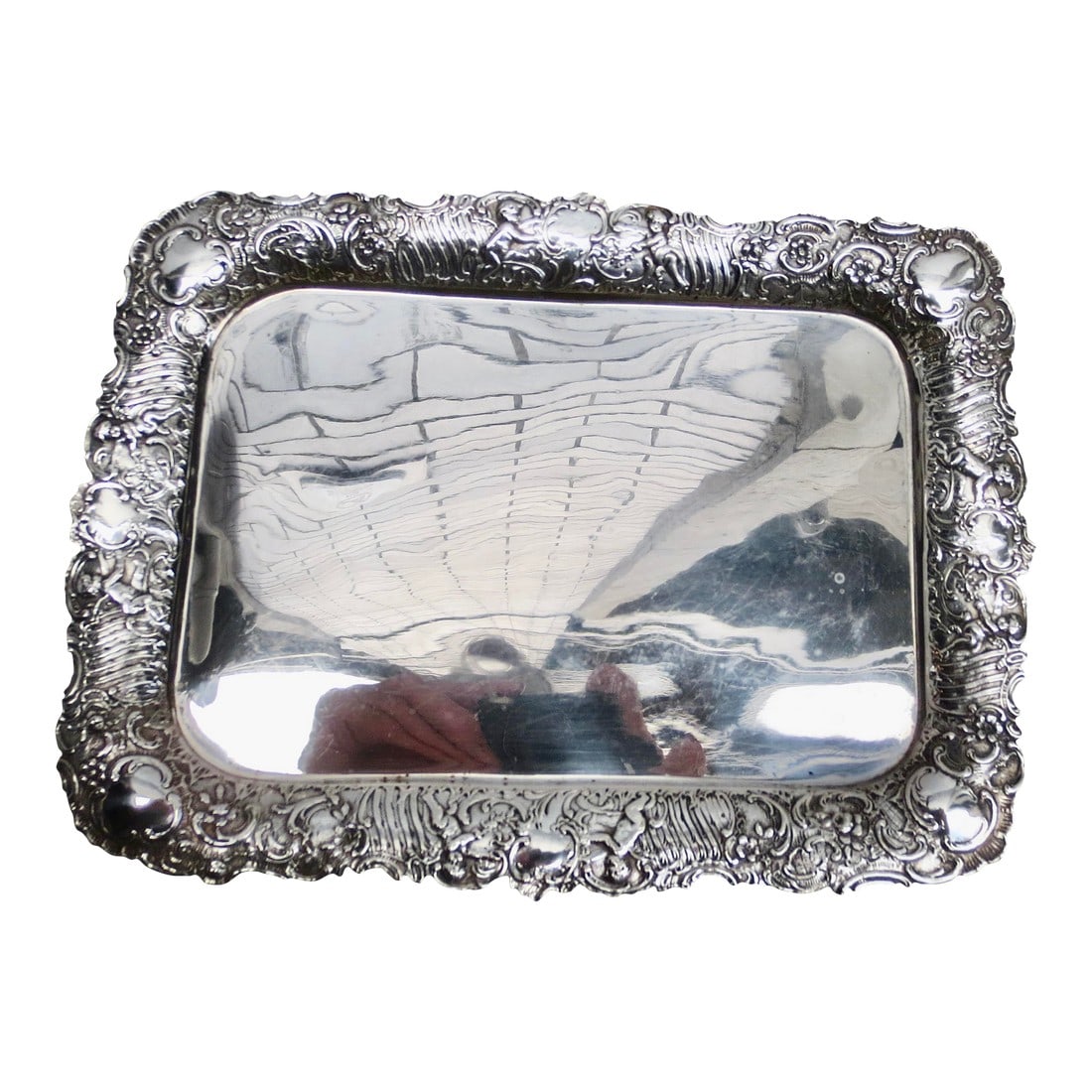 Bruckmann & Son of Heilbronn, c.1900. Silver Tray 11 Oz.: Beaux Arts period and design with Putti centered on each edge"”fabulous pattern of scrolling cartouches and glyphs over the entire border. Stamped with an 800 mark on the bottom and crown.