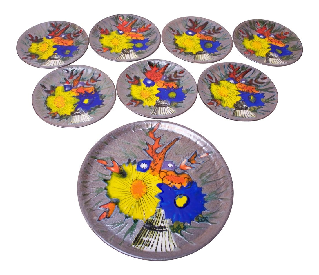 Vintage French Porcelain Enamel 'Floral' Cake Plates - Set of 8: This unique set of eight porcelain enamel cake plates includes one large serving plate and seven small plates. Each plate is marked "˜France' on the reverse. Modernist design, boasting vibrant