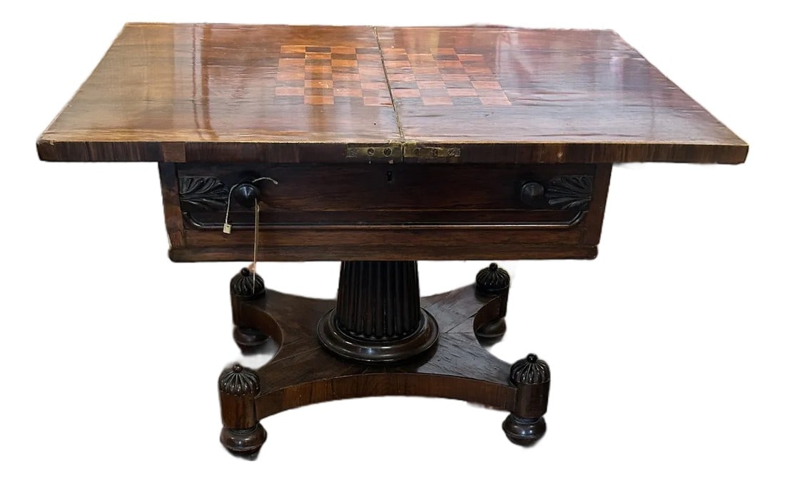 19th Century Mahogany Inlaid Small Coffee Table With Checkerboard Top: A rare find in this small Regency style antique mahogany coffee table having inlaid checkerboard on top and single drawer. The fluted columnar base is especially handsome with 4 domed decorative