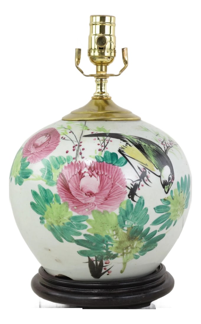 Famille Rose Antique Porcelain Vase Lamp With Bird and Floral Motif on Wood Base: This antique table lamp is repurposed from an authentic white porcelain vase decorated in a vibrant Famille Rose palette. The rounded, tapered body features a detailed scene of a yellow and black