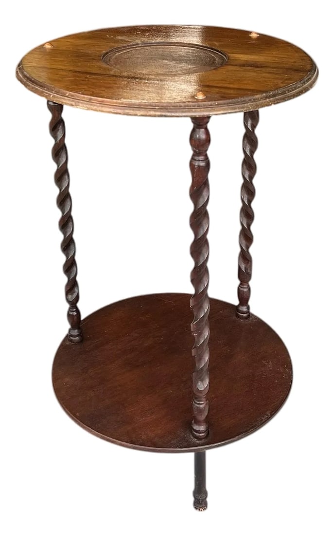 Vintage Walnut Finish Two Tier Barley Twist Table: Vintage walnut finish two tier barley twist table, bowl stand or plant stand. Measures 17.25" diameter x 28" h. Inner circle is recessed .25" x 7" diameter. Condition: Alterations: Original Condition