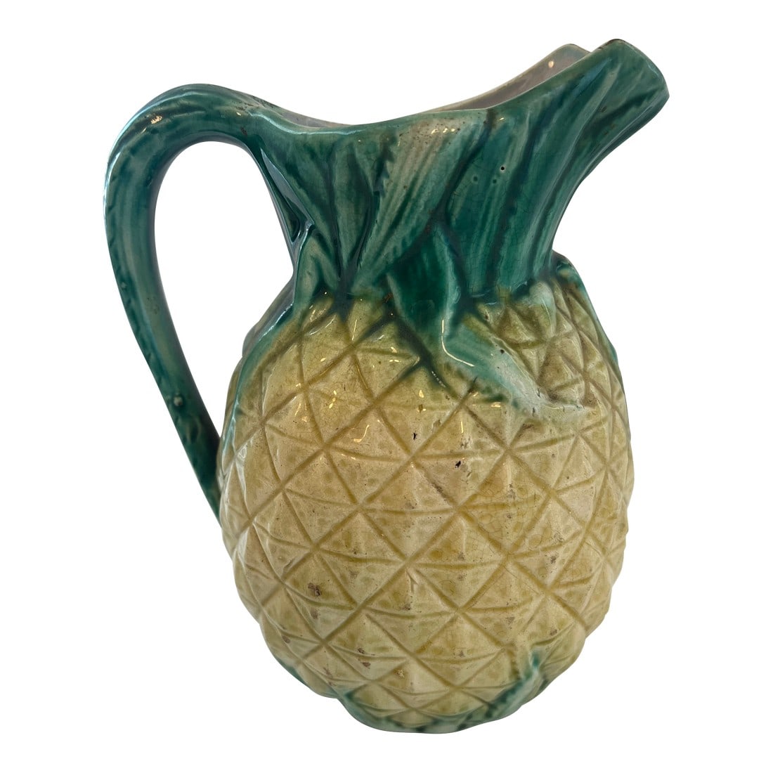 1900s Pineapple Form Majolica Pitcher: Pineapple Form, ceramic majolica pitcher. Probably Italian early 20th century Condition: Alterations: Original Condition Unaltered Imperfections: Some Imperfections Condition Notes: In excellent