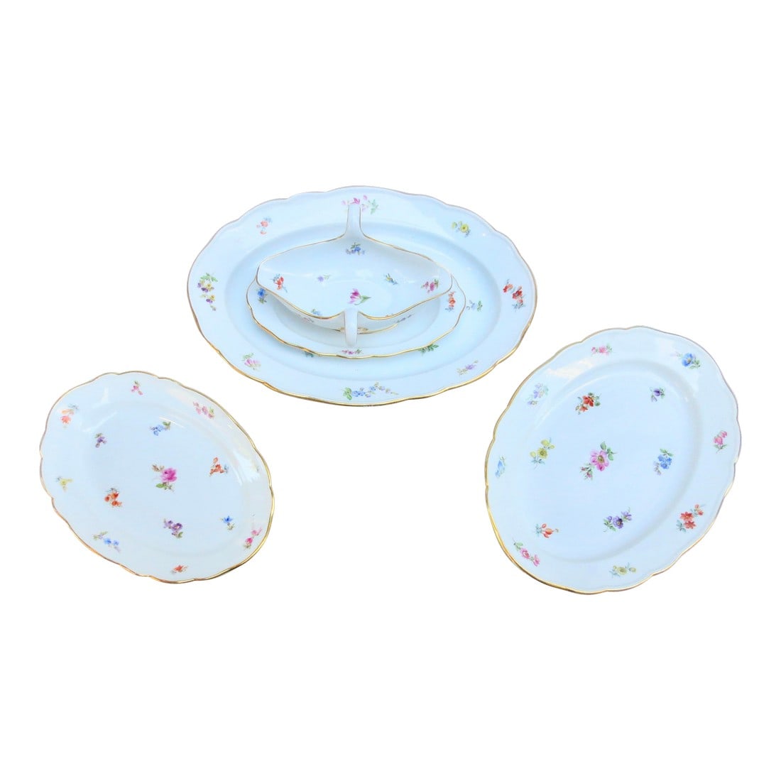 Mid 20th Century Meissen Serving Trays and Sauce Boat- Set of 4 Pieces: Meissen Scattered Flowers Pattern-- Set of 4 pieces excellent condition, and the measurements are of 3 size platters: large 16" by 12". Med. 13.5" by 10". small 11" by 8". The gravy/sauce boat is a on