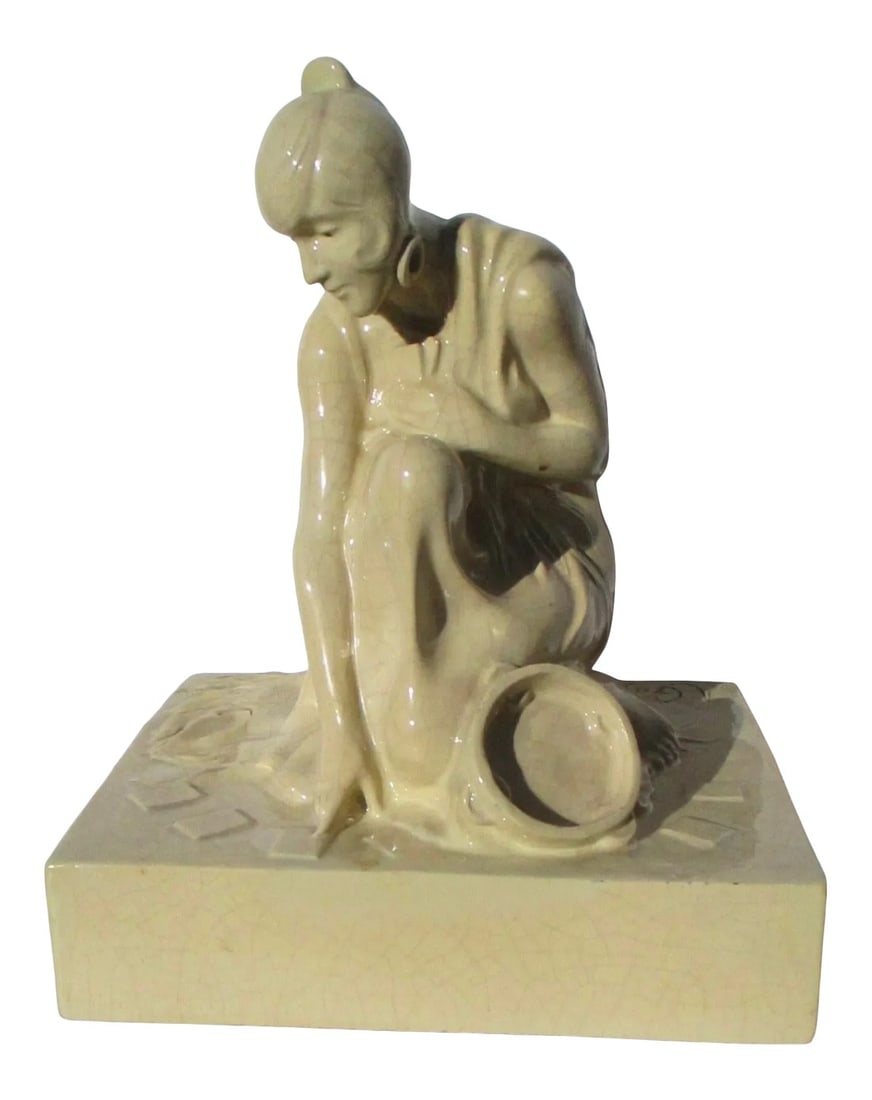 1930s Armand Godard French Faience Fortune Teller Figure: French 1930s' Femme fatal lady. A fortune teller reading the cards in a very beautiful and striking poise kneeling to read the future on the face of the cards. Signed A. Godard on the base with the