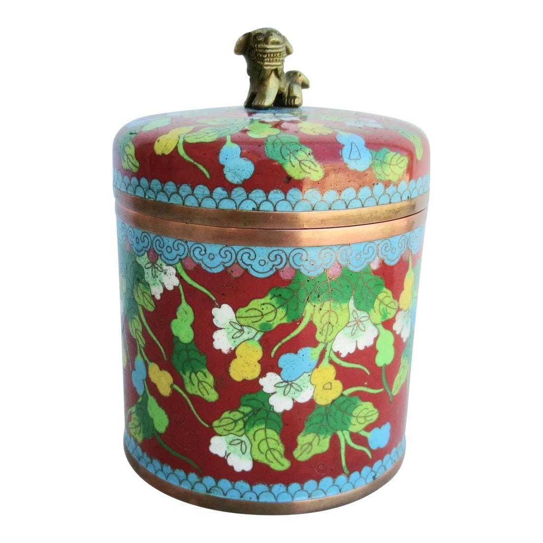 Vintage Chinese Enamel Tea Caddy Circa 20s-30s: Enamel on copper canister with a deep red body with yellow and white flowers. Bright color families of the Chinese Art Deco style, red, blue, green. Blue border trim with the same blue interior and