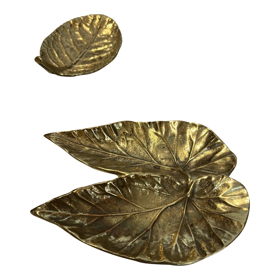 1970s Solid Brass Leaf Trays Catchall- Set of 2: These stylish trays make the perfect catch all for any decor! Brass made into the shape of leaves! Great, fun way to organize those little things that easily get lost or great place to drop your keys