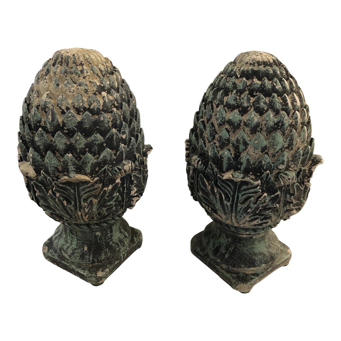 Vintage Pineapple Shaped Finial Sculptures -A Pair: Timeless pineapple motife cast cement finials or acorns having marvelous aged and verdigris patina. The imperfections where some of the cement has chipped off, and the slight differences in the finial