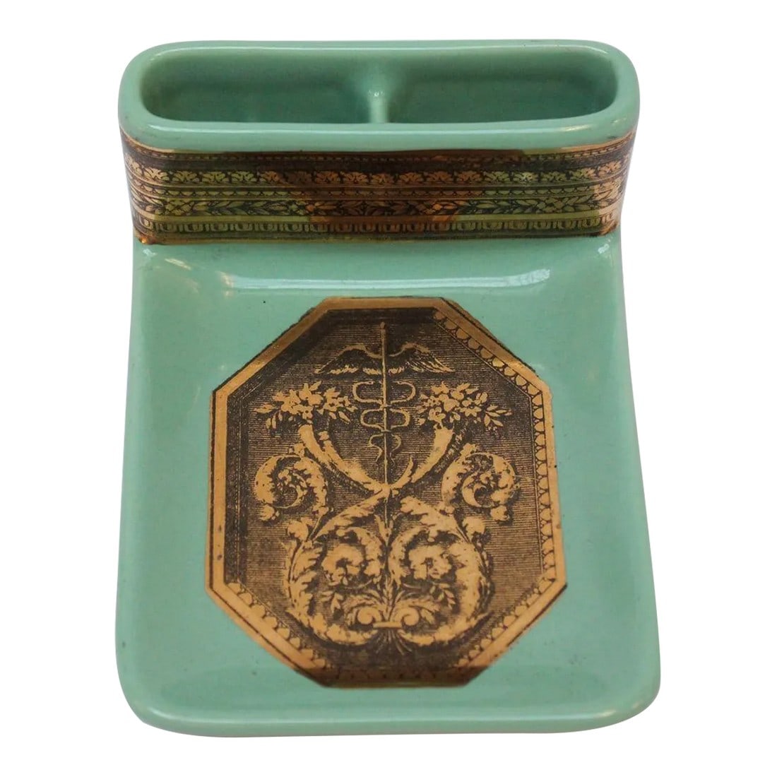 Vintage Piero Fornasetti "Caduceus" Lithograph Gilt Porcelain Green Ashtray: Vintage celadon/mint green ceramic ashtray/trinket dish with cigarette slots by Piero Fornasetti, (circa 1950s, Italy). Features lithographic transfer and gilt on porcelain - the pattern depicting a c