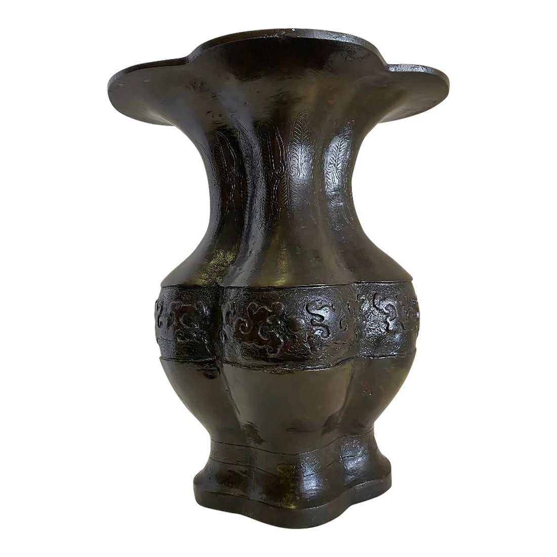 Chinese Bronze "Gu" Vase: Late 19th century Chinese " GU" vase with four bulbous lobes and a flared opening. It has etching and raised decoration It is well marked on the bottom. The bottom base is 8 inches by 6 inches.
