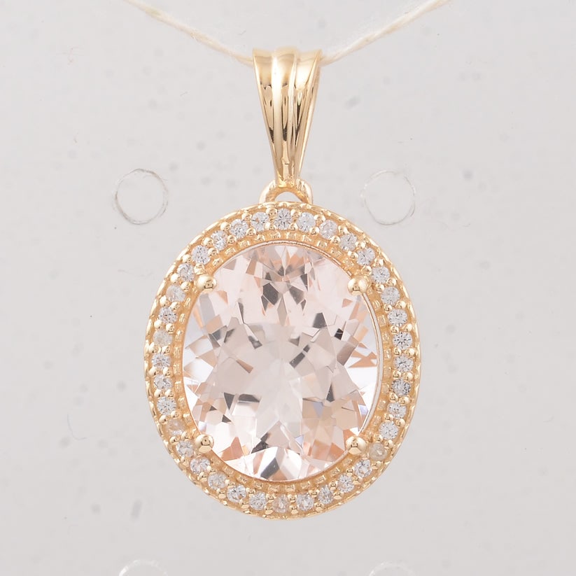 3.31 Ct Oval Morganite 9K Gold Pendant: 3.31 Total Carat Morganite 9K Gold Pendant Specifications: Total Weight 1.93 g Center Gemstone Morganite Gemstone Carat Weight 3.15 Carats Gemstone Measurements 11X9X5.50 mm Additional Gemstones